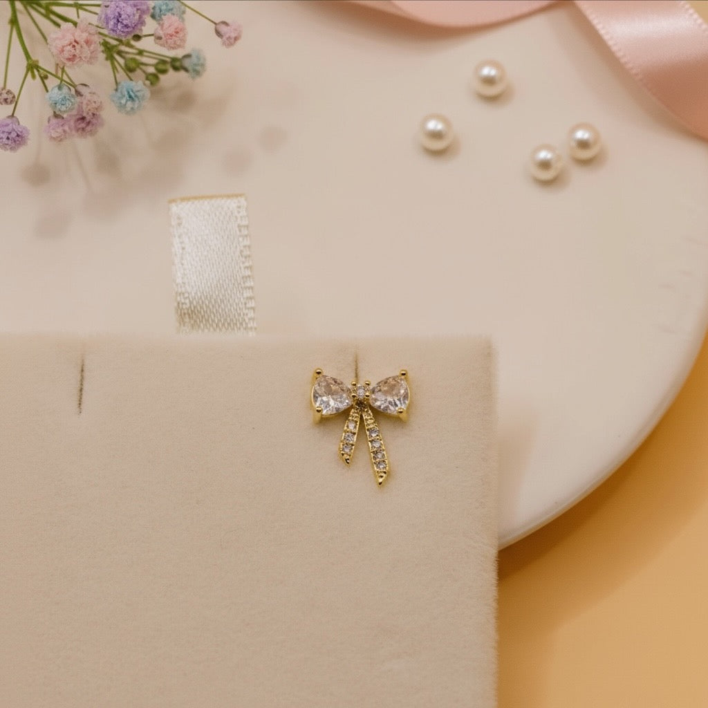 Crystal Whisper Bow earrings (Gold Finish)