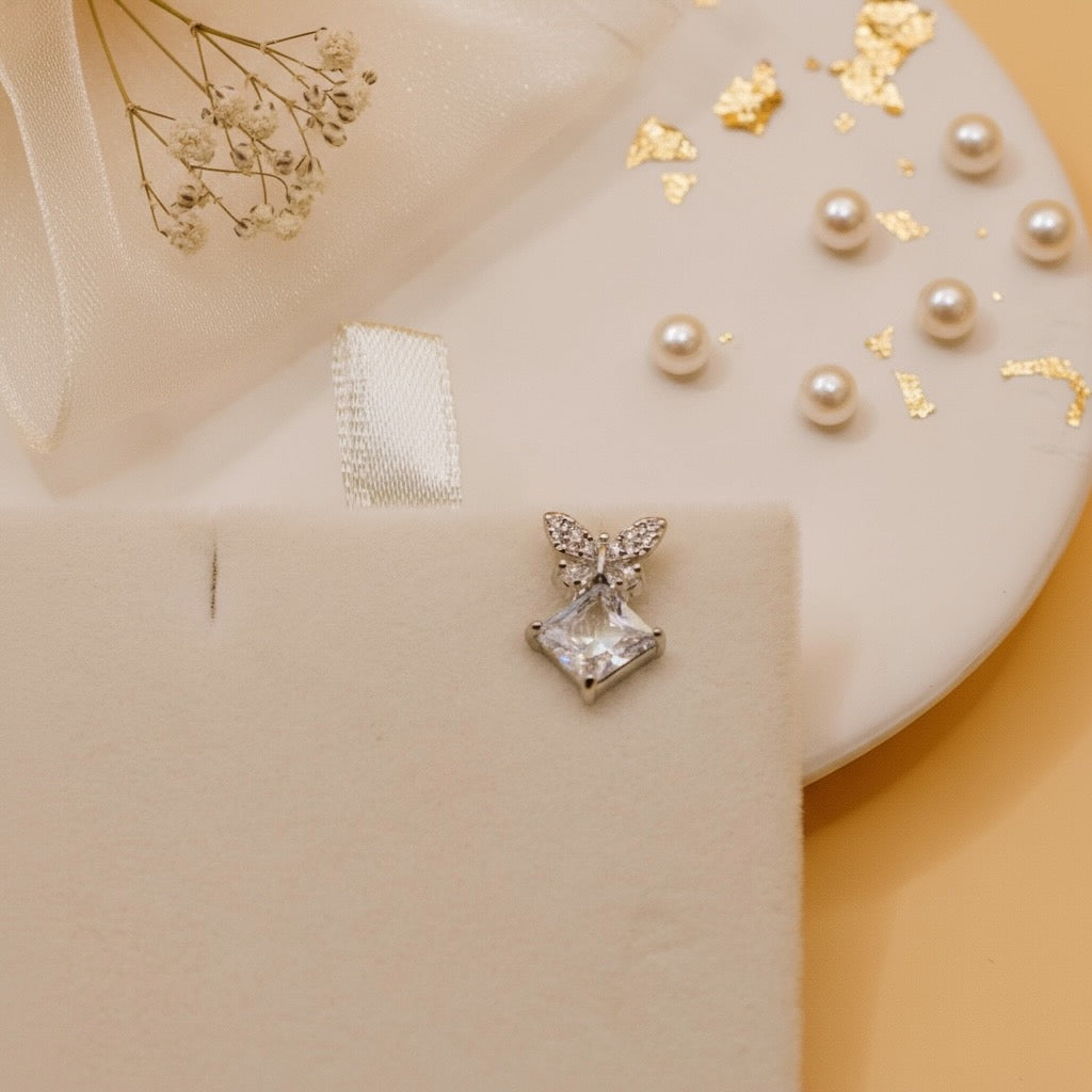 Butterfly Glow Studs (Silver Finish)